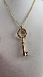 Nina Ricci Gold-Tone Necklace with Key Charm - 2584