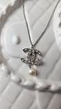 Chanel Silver Tone Necklace with CC Pendant - 1657