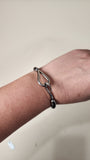 Hermes Black Leather and Silver Tone Bracelet - G0013