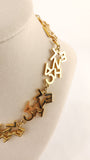 Chanel Gold Tone Cluster 'Chanel' Necklace - G0583